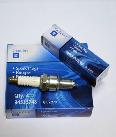 Imagen ilustrativa de BUJIAS ORIGINALES X4 SPARK 1.0